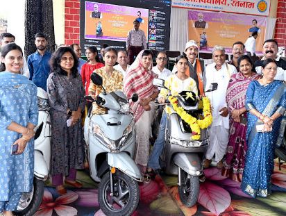 Scooty distribution to topper students